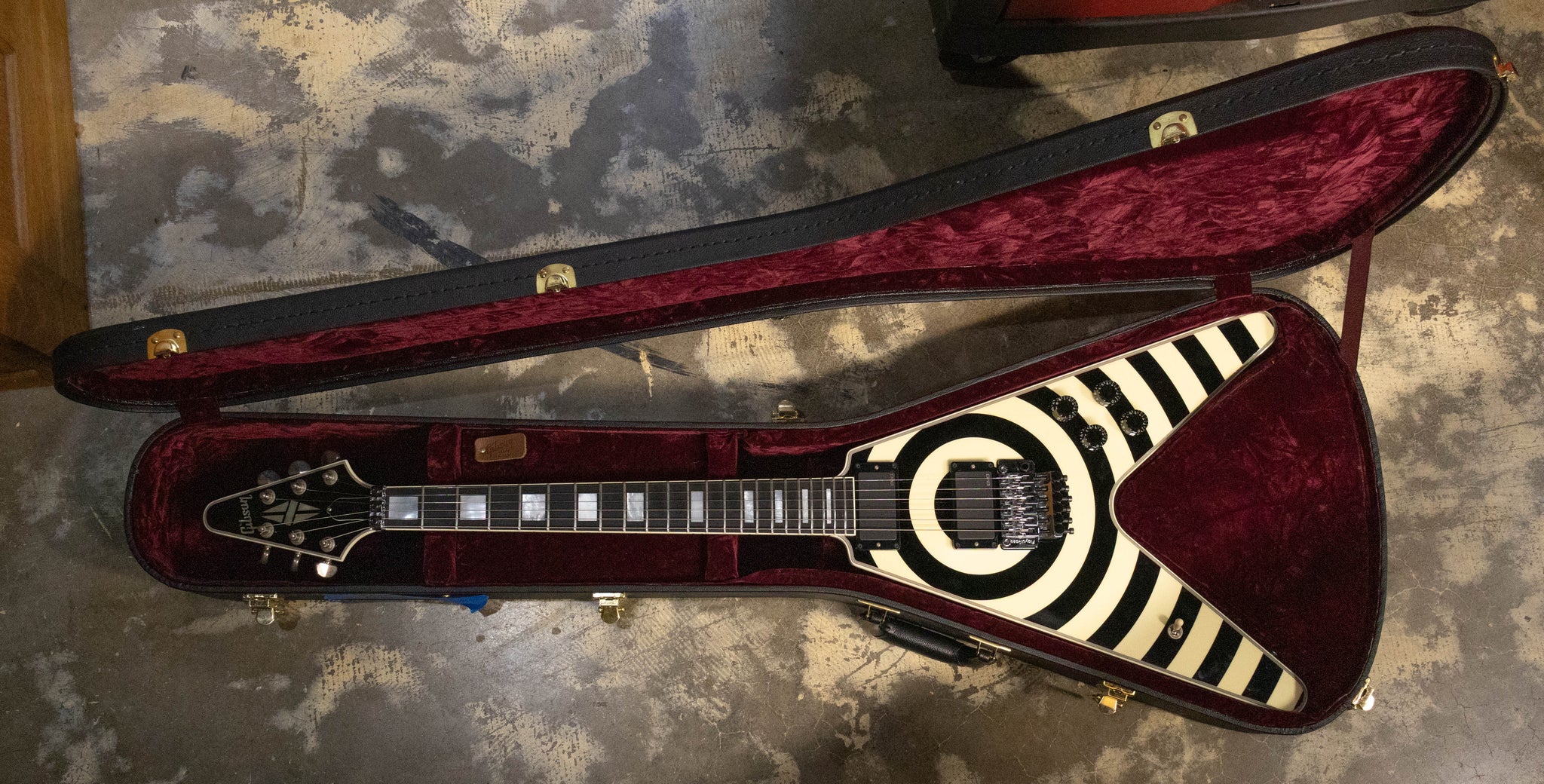 The Flying V in its open Gibson case