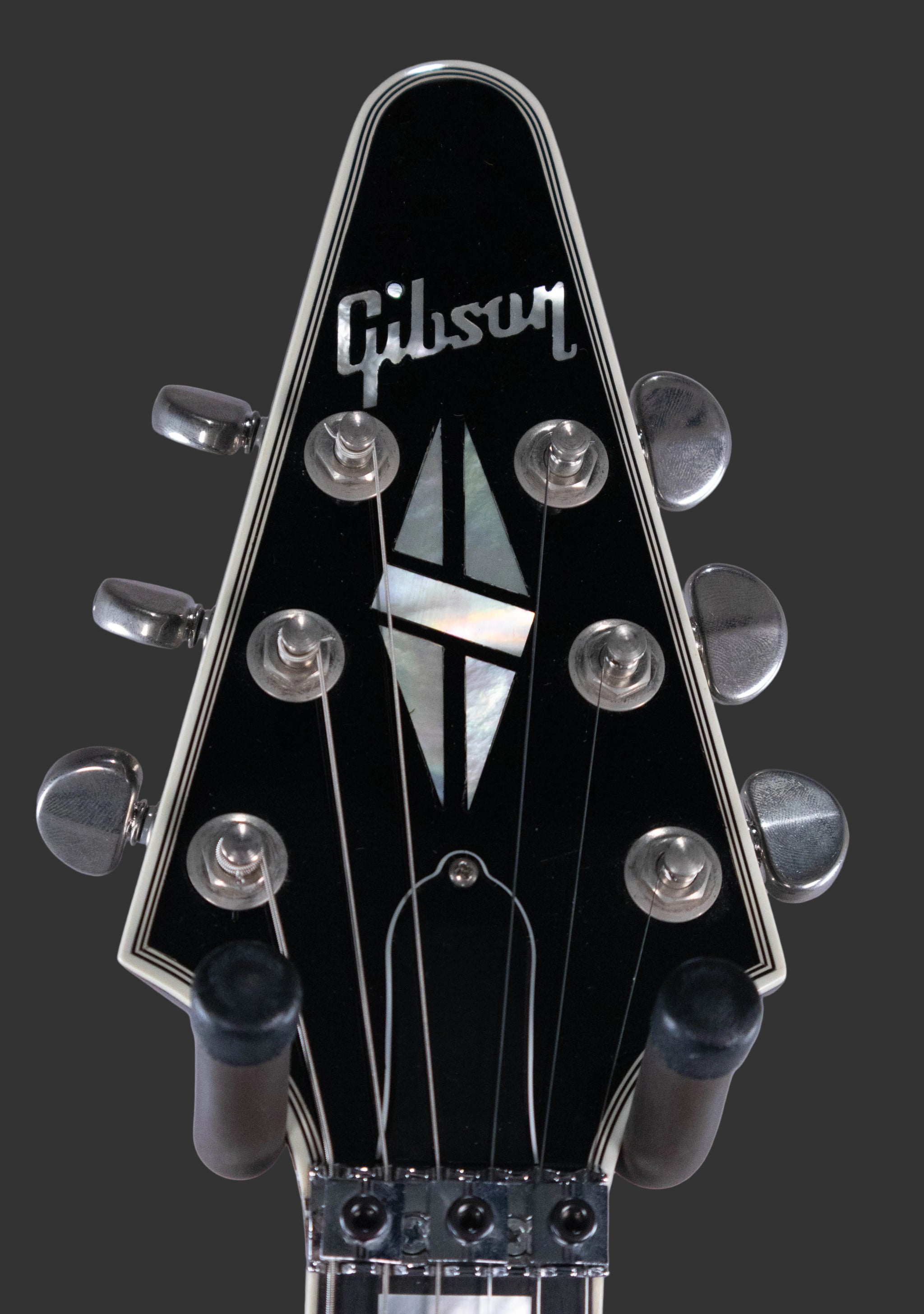 Front of the bound headstock with Gibson logo and inlay