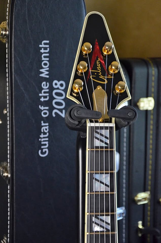 Headstock and fretboard detail of the Brimstone Flying V