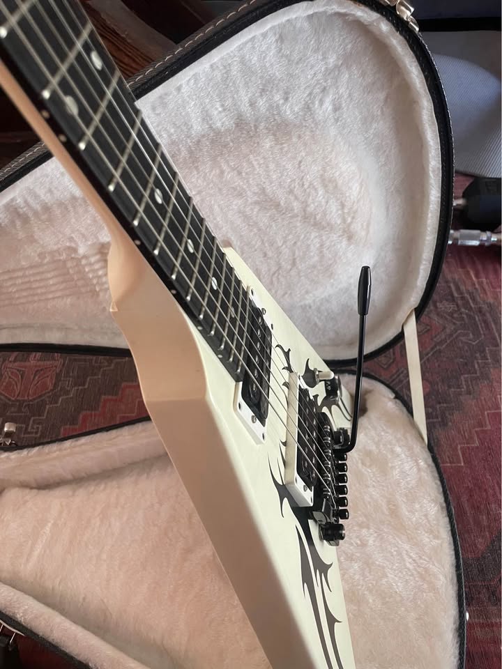 Close-up of the Kahler vibrato bridge and arm on the Gibson Tribal V