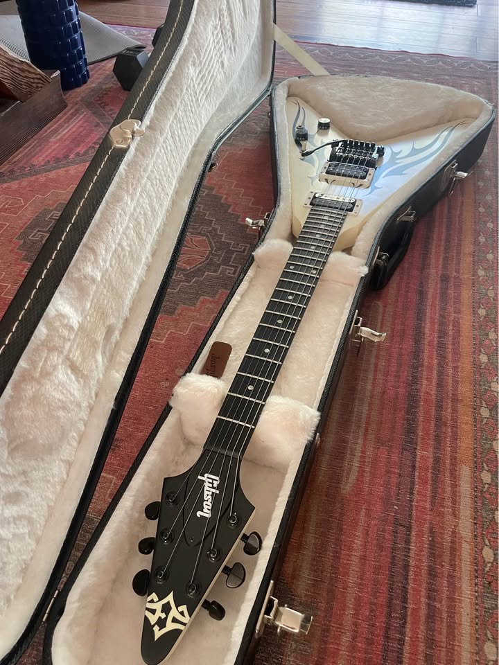 Gibson Tribal V and headstock in its case