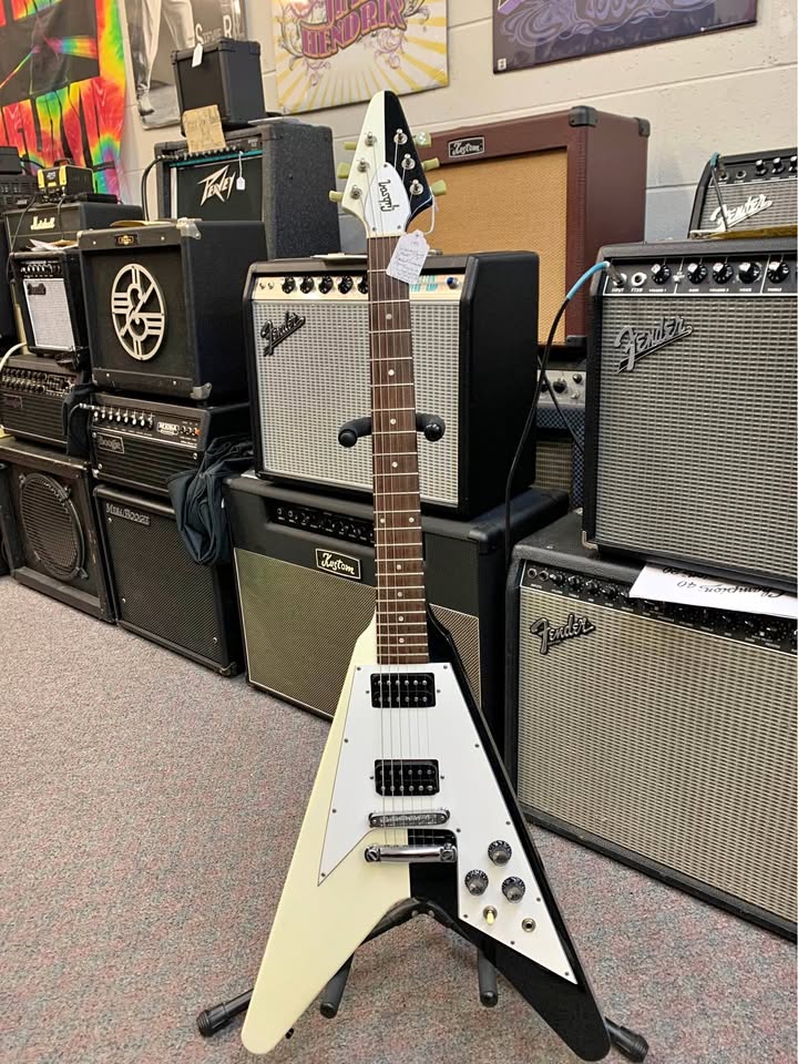Full front view of the second split-finish 1993 Rudolf Schenker Flying V, with the light half still mostly white