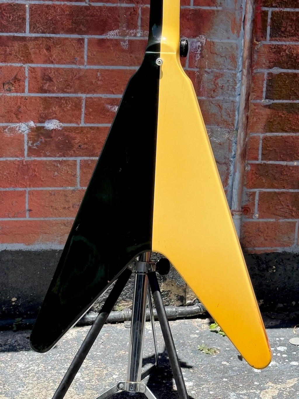 Updated rear view showing the white side of the 1993 Rudolf Schenker Flying V now appearing gold