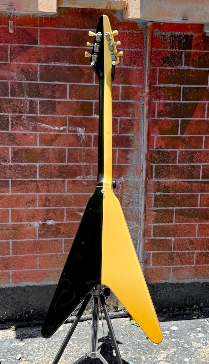 Back view of the split-finish guitar