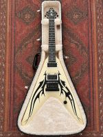 Full view of the 2009–10 Gibson Tribal V in its case