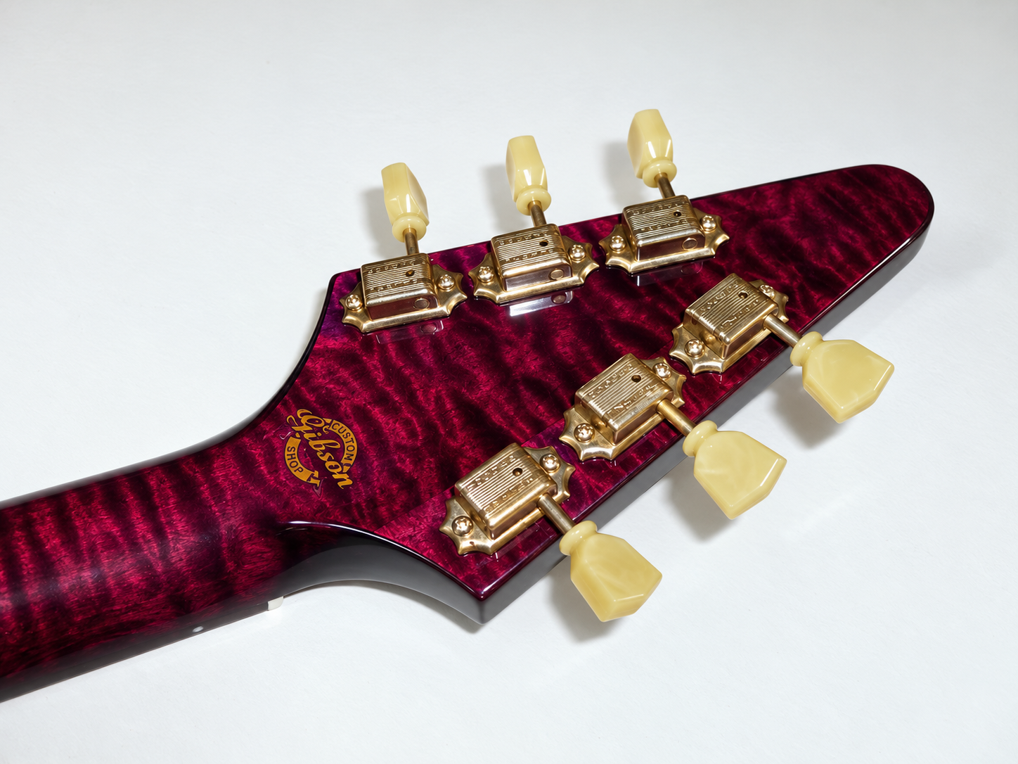 Back of the headstock on the purple quilt-top Flying V