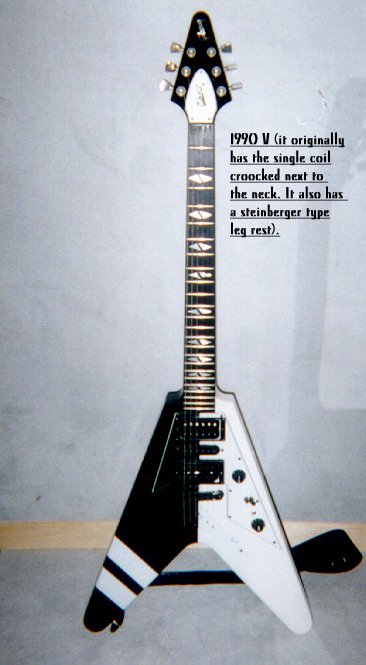 Modified black and white Gibson V90 Double with neck single-coil and bridge humbucker