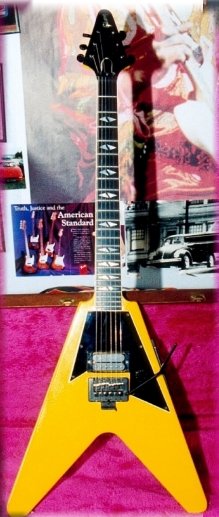 Yellow single-pickup Gibson V90, front view
